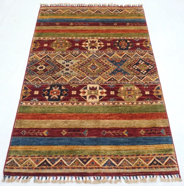 Afghan tribal Khorjin rug knotted by hand with hand-spun, vegetable-dyed wool.