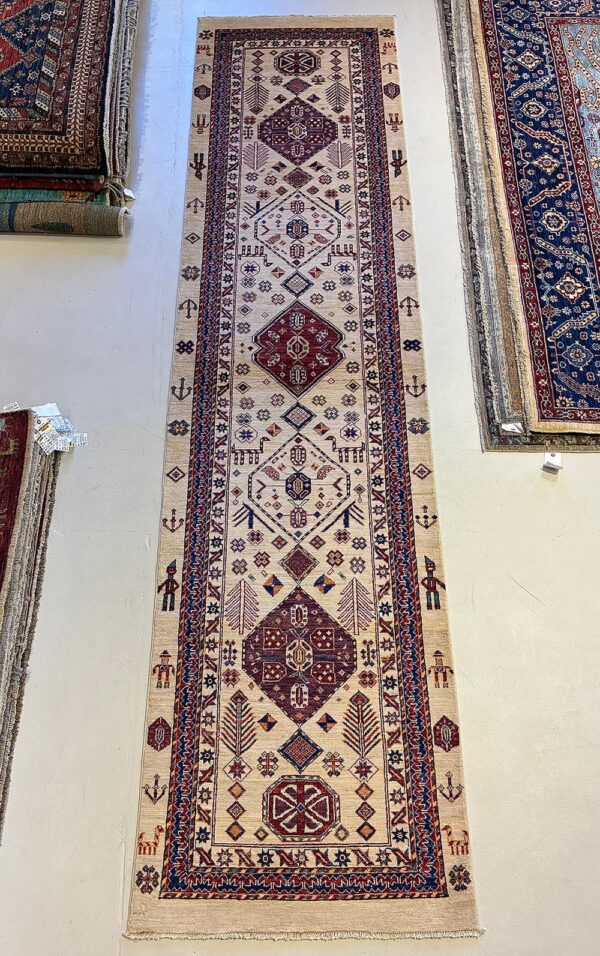 Afghan tribal Kurd rug knotted by hand with hand-spun, vegetable-dyed wool.
