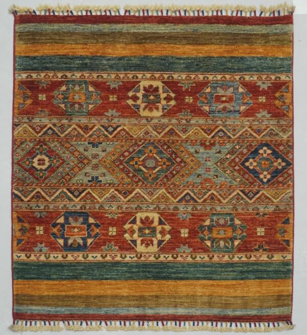 Afghan tribal Khorjin rug knotted by hand with hand-spun, vegetable-dyed wool.