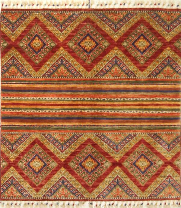 Afghan tribal Khorjin rug knotted by hand with hand-spun, vegetable-dyed wool.