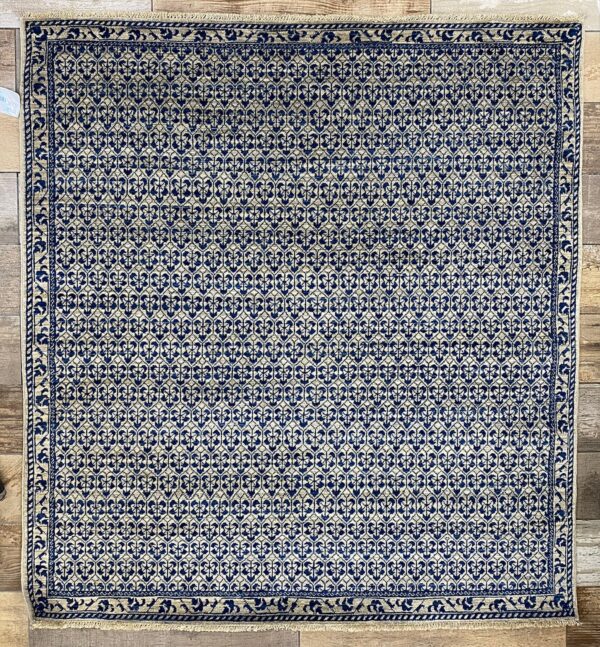 Afghan Jaal rug knotted by hand with hand-spun, vegetable-dyed wool, with roots in the Persian and Mughal weaving traditions.