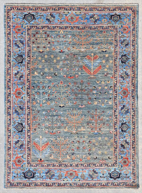 Afghan Bakshaish garden rug knotted by hand with hand-carded, hand-spun, vegetable-dyed wool. All-over tree of life motifs.