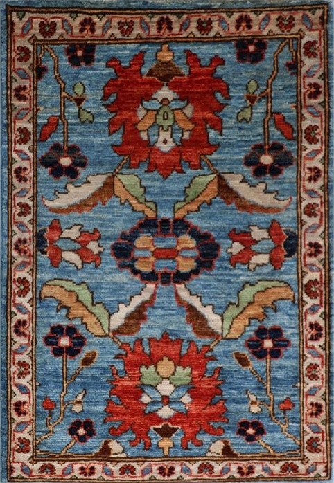 Afghan Ferahan rug knotted by hand with hand-spun, vegetable-dyed wool. A classic floral design.