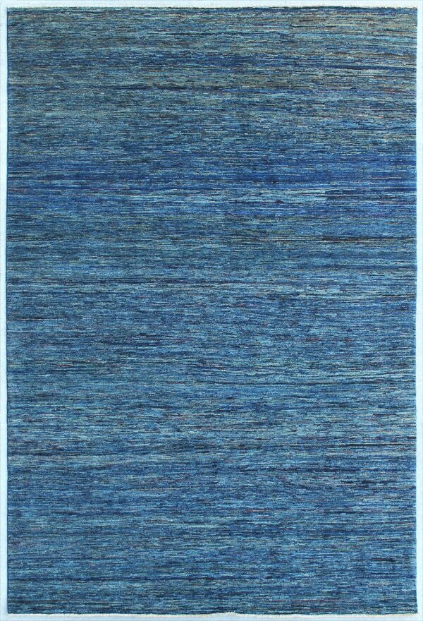 Afghan Gabbeh rug knotted by hand with hand-carded, hand-spun, vegetable-dyed wool.