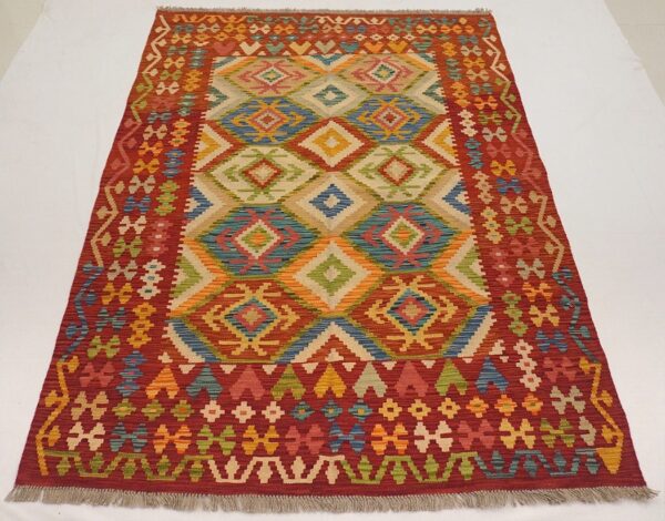 Afghan Maimana kilim flatweave rug hand-knotted with natural wool.