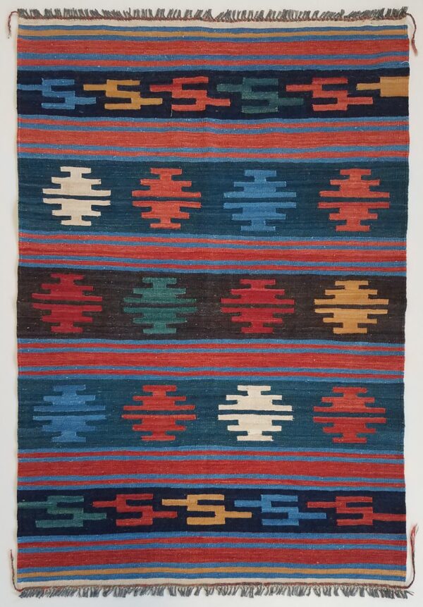 Afghan Mogoli kilim flat-weave rug woven by hand with hand-carded, hand-spun, natural-dyed wool.