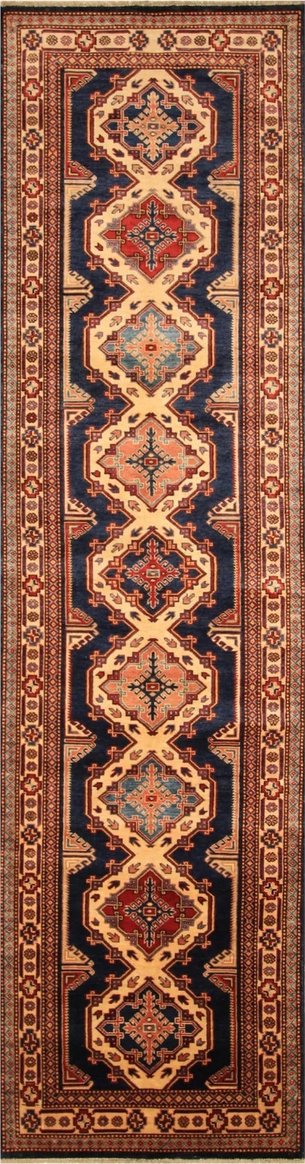 Afghan Kazak rug knotted by hand with hand-spun, vegetable-dyed wool.