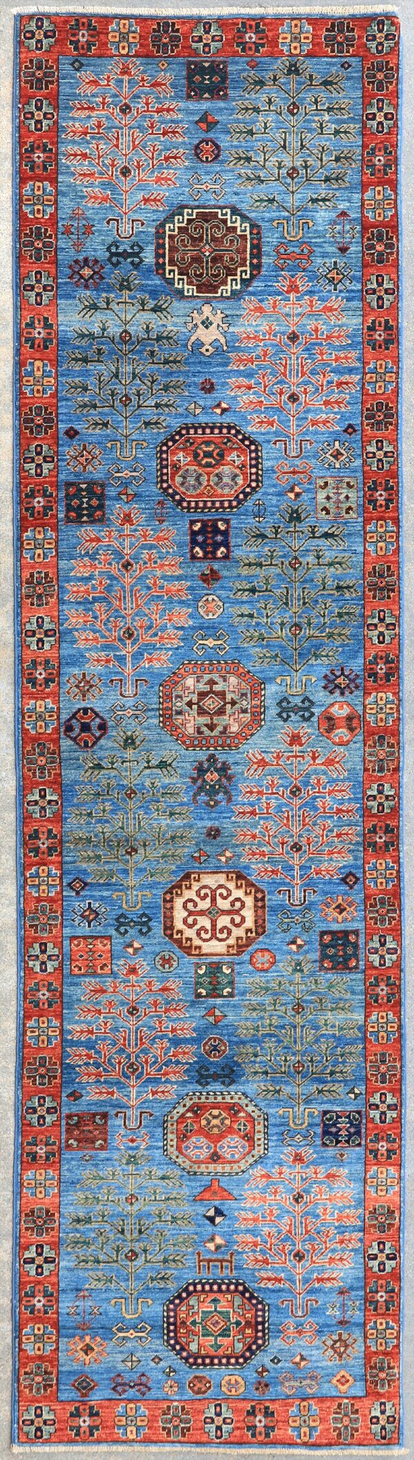 Afghan Tree Kazak rug knotted by hand with hand-carded, hand-spun, vegetable-dyed wool.