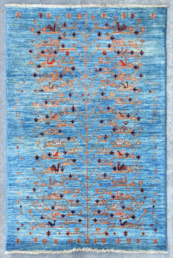 Afghan Tree of Life Gabbeh rug knotted by hand with hand-carded, hand-spun, vegetable-dyed wool.