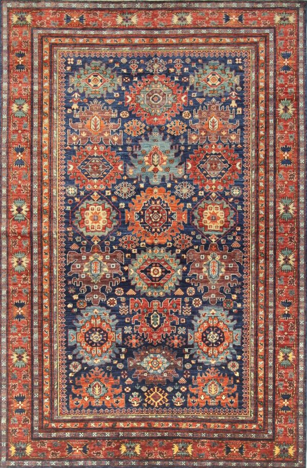 Afghan Shirvan rug knotted by hand with hand-carded, hand-spun, vegetable-dyed wool. All-over jewel tone tribal medallions.