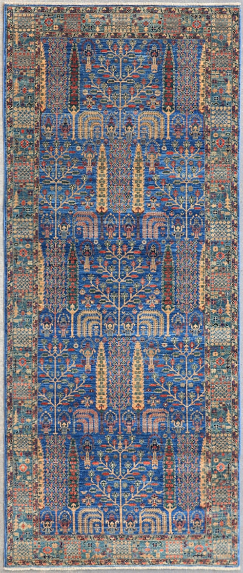 Afghan Bakshaish garden rug knotted by hand with hand-carded, hand-spun, vegetable-dyed wool. All-over tree of life motifs.