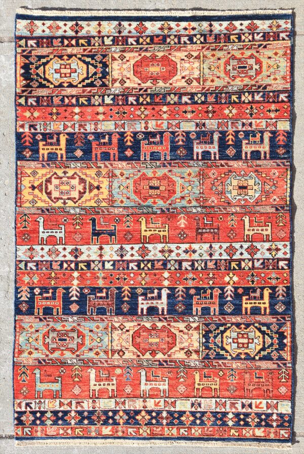 Afghan tribal Kurd rug knotted by hand with hand-carded, hand-spun, vegetable-dyed wool.
