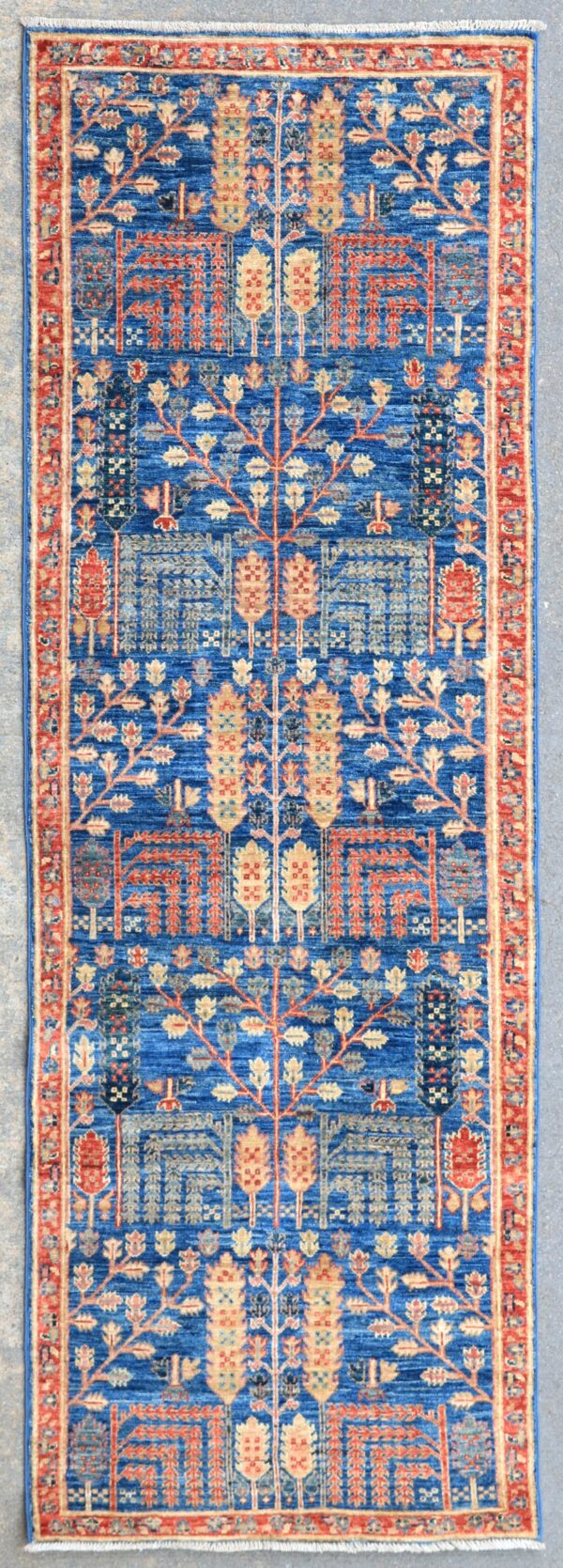 Afghan Bakshaish garden rug knotted by hand with hand-carded, hand-spun, vegetable-dyed wool. All-over tree of life motifs.