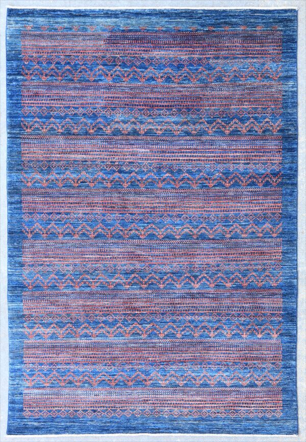 Afghan Gabbeh rug knotted by hand with hand-carded, hand-spun, vegetable-dyed wool.