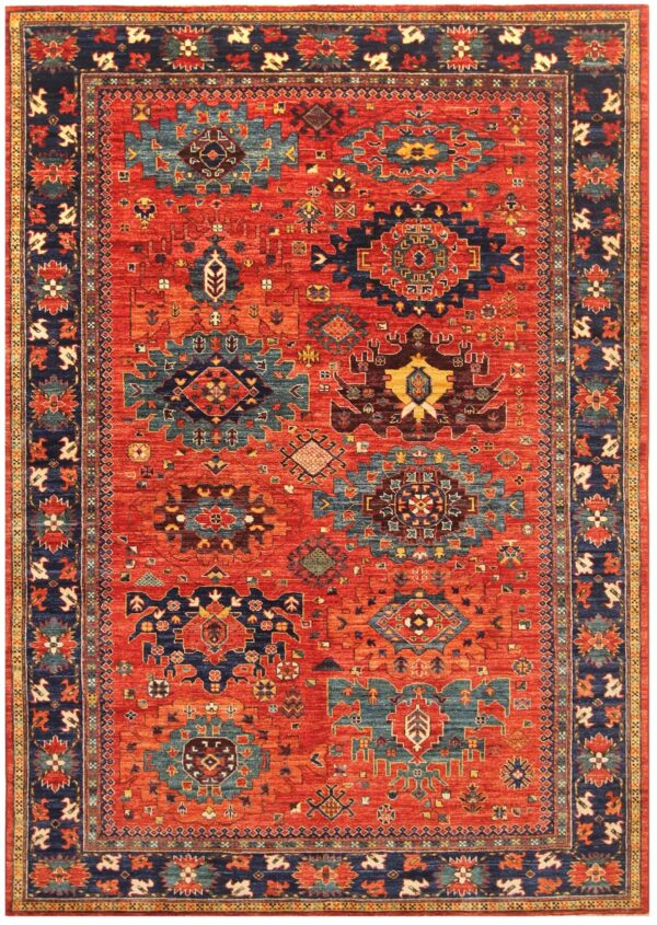 Afghan Shirvan rug knotted by hand with hand-carded, hand-spun, vegetable-dyed wool. All-over jewel tone tribal medallions.