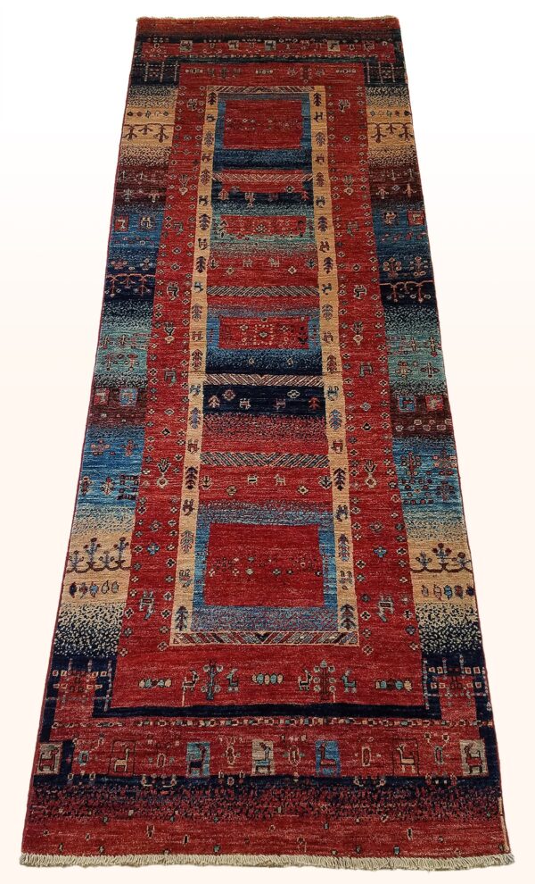 Afghan Gabbeh rug knotted by hand with hand-carded, hand-spun, vegetable-dyed wool.