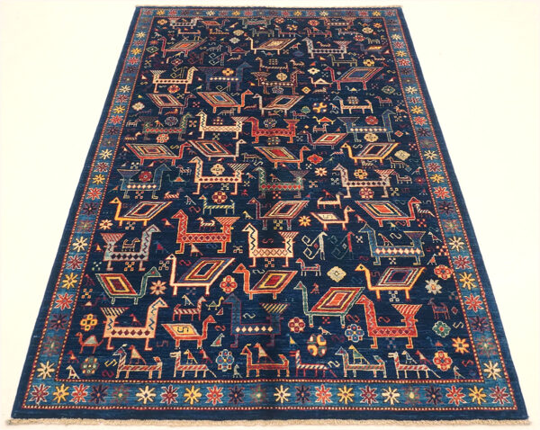Afghan all-over animal Qashqai rug knotted by hand with hand-spun, vegetable-dyed wool.