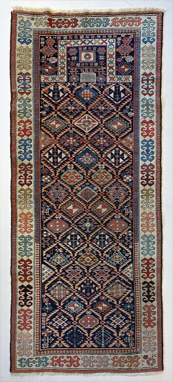 Antique Caucasian Akstafa Prayer Kazak rug knotted by hand with hand-carded, hand-spun, vegetable-dyed wool.
