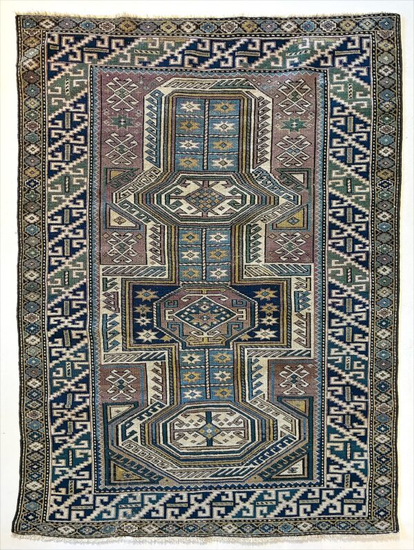 Antique hand-knotted Caucasian Keyhole Konaghend rug.