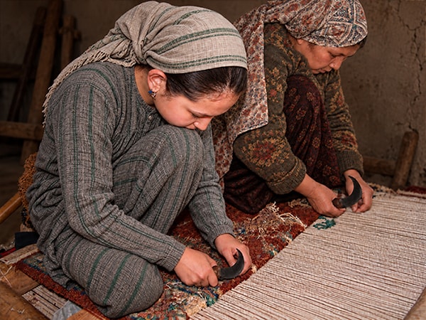 Rug weavers in Afghanistan